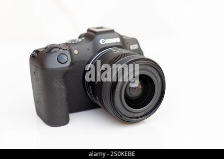 The Canon EOS R8 mirrrorless camera with interchangeable canon RF 24- 50 lens Stock Photo
