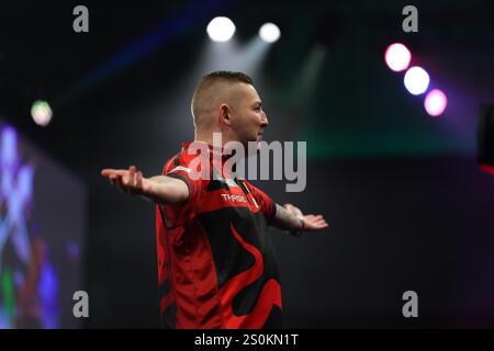 Alexandra Palace, London, UK. 28th Dec, 2024. 2024/25 PDC Paddy Power World Darts Championships Day 11; Nathan Aspinall raising his arms towards the spectators before playing his third round match against Andrew Gilding Credit: Action Plus Sports/17�Թ����� Live News Stock Photo