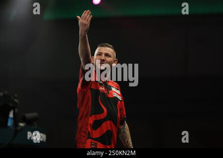 Alexandra Palace, London, UK. 28th Dec, 2024. 2024/25 PDC Paddy Power World Darts Championships Day 11; Nathan Aspinall raising his arms towards the spectators before playing his third round match against Andrew Gilding Credit: Action Plus Sports/17�Թ����� Live News Stock Photo