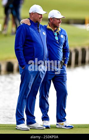 Sep 30, 2018; Paris, FRA; Europe captain Thomas Bjorn and Europe vice-captain Lee Westwood after the Ryder Cup Sunday singles matches at Le Golf National. Stock Photo