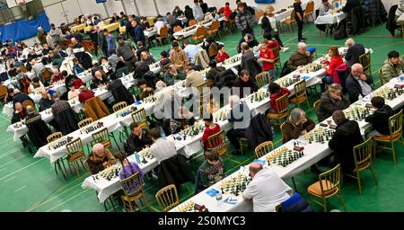 Hastings, UK. 28th Dec, 2024. Overhead view of the competitors during the 98th Caplin Hastings International Chess Congress, incorporating the 40th Hastings Weekend Congress at the Horntye Park, Hastings, UK. Credit: LFP/Alamy Live News Stock Photo