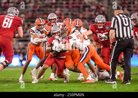 Photos Back Ran Washington State running back Leo Pulalasi carries the ball during the ...