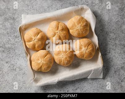 freshly baked bread buns, top view Stock Photo
