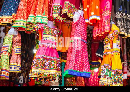 Small shop with indian colorful dresses in Delhi Stock Photo