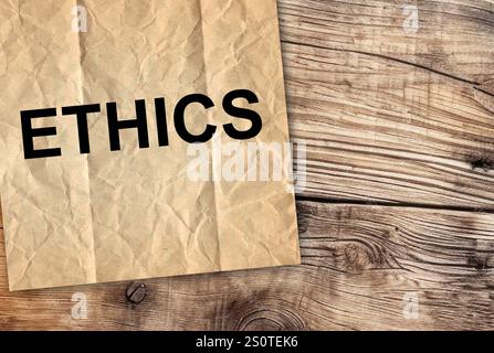 Ethics word on white paper. Business ethic Concept. Stock Photo