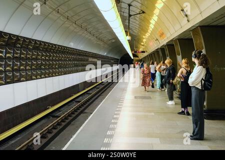 Passengers Waiting for Train Arrival on Underground Metro Platform. Prague, Czech Republic, Czechia. Stock Photo