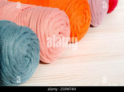 Colored skeins of thread for weaving macrame close-up. Cotton threads of Turkish production. Stock Photo