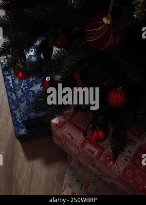 Wrapped Christmas Gift Boxes Lying under Decorated Fir Tree Stock Photo ...
