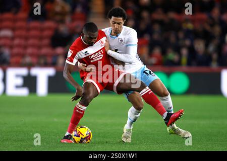 Burnley's CJ Egan-Riley (left) and Southampton's Mateus Fernandes ...