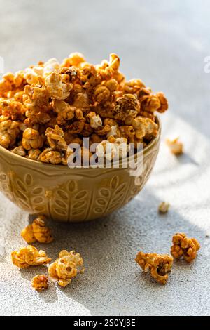 Sweet caramel popcorn in the bowl Stock Photo