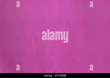 Dark pink packing paper texture. Rose tone scrapbook style background. Stock Photo