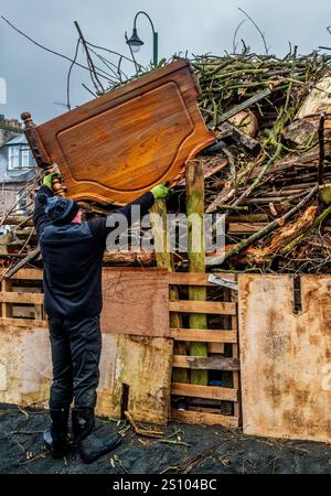 Building the traditional hogmanay bonfire in Biggar, South Lanarkshire, Scotland. Stock Photo