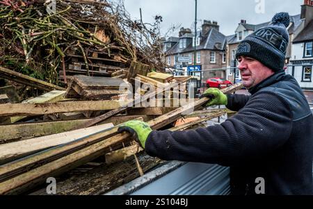 Building the traditional hogmanay bonfire in Biggar, South Lanarkshire, Scotland. Stock Photo