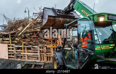 Building the traditional hogmanay bonfire in Biggar, South Lanarkshire, Scotland. Stock Photo