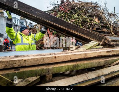 Building the traditional hogmanay bonfire in Biggar, South Lanarkshire, Scotland. Stock Photo