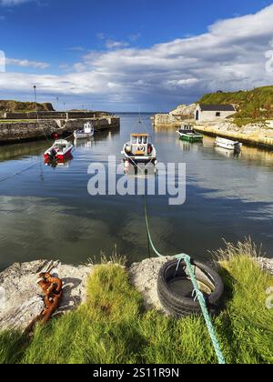 Picturesque harbour with fishing boats, film set, film location for Game of Thrones, Iron Island Harbour, Ballintoy Harbour, Causeway Coastal Route, A Stock Photo