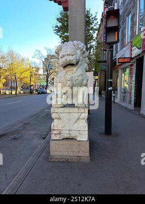 Lion sculpture at the Chinatown gate on St. Laurent in Montreal, Quebec, Canada Stock Photo