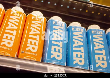 Los Angeles, California, United States: 04-07-2019: A view of several bottles of Just Water bottles on a shelf at the grocery store. Stock Photo