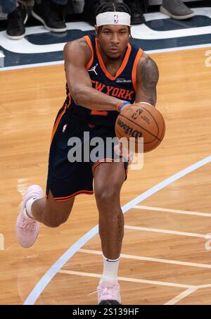 New York Knicks guard Miles McBride (2) looks to shoot past Golden ...