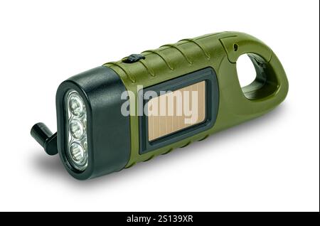 Side view of mini solar cranking LED flashlight isolated on white background with clipping path. This device charge battery by solar cells or  turning Stock Photo