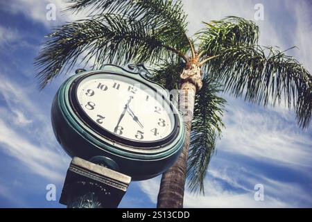 A view of an old fashioned analog clock, seen in Orange, California. Stock Photo