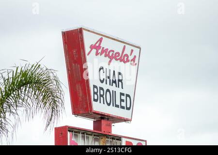 Santa Ana, California, United States - 04-15-2019: A view of a street side sign for the burger chain known as Angelo's Burgers. Stock Photo