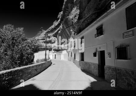 View of houses built into the rocks in Cabrerizas street, Setenil de las Bodegas, Cadiz Province, Spain. Stock Photo