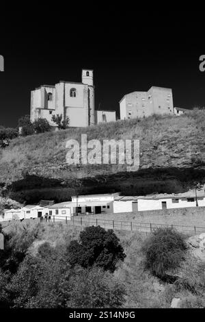 View of the Castle and the River Trejo, Setenil de las Bodegas, Cadiz Province, Spain. Stock Photo