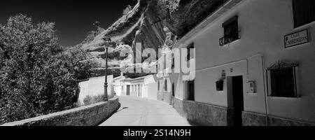 View of houses built into the rocks in Cabrerizas street, Setenil de las Bodegas, Cadiz Province, Spain. Stock Photo