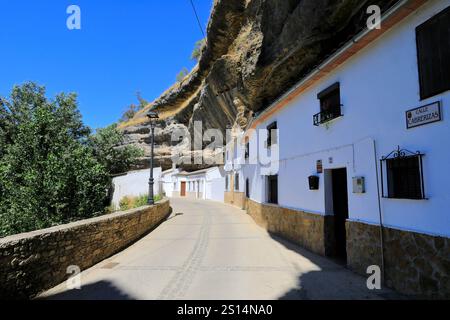 View of houses built into the rocks in Cabrerizas street, Setenil de las Bodegas, Cadiz Province, Spain. Stock Photo