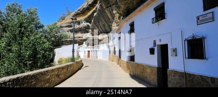 View of houses built into the rocks in Cabrerizas street, Setenil de las Bodegas, Cadiz Province, Spain. Stock Photo