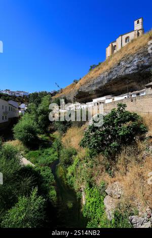 View of the Castle and the River Trejo, Setenil de las Bodegas, Cadiz Province, Spain. Stock Photo