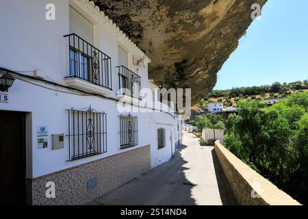 View of houses built into the rocks in Cabrerizas street, Setenil de las Bodegas, Cadiz Province, Spain. Stock Photo