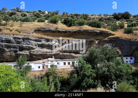 View of houses built into the rocks in Cabrerizas street, Setenil de las Bodegas, Cadiz Province, Spain. Stock Photo