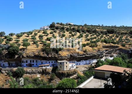 View of houses built into the rocks in Cabrerizas street, Setenil de las Bodegas, Cadiz Province, Spain. Stock Photo