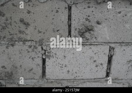 close image of raw Old concrete block wall background and texture Stock Photo