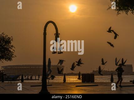 New Year In Doha The first sunrise of the year shines on the Old Doha Port in Doha, Qatar, on January 1, 2025. DOHA Qatar Copyright: xNOUSHADx Stock Photo