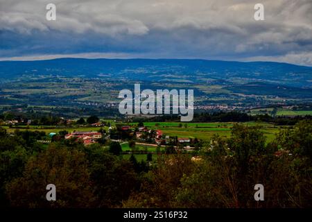 Chambles, France - October 5th 2024 : View of la Plaine du forez from the Essalois castle. Stock Photo