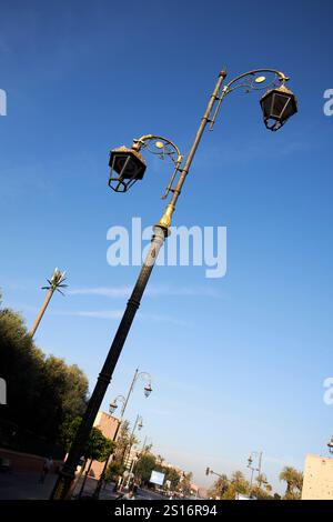 old ornate style street lighting upgraded to led downtown marrakesh, morocco Stock Photo