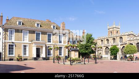 Wykeham House a georgian mansion and All saints church in the Market place Huntingdon town centre Huntingdon Cambridgeshire England UK GB Europe Stock Photo