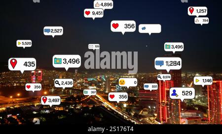 Social media icons fly over city downtown showing people engagement connection through social network application platform . Concept for online Stock Photo