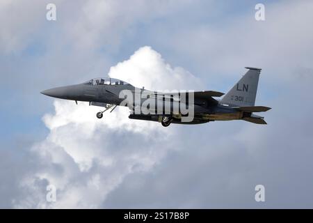 McDonnell Douglas Boeing F-15E Strike Eagle, strike fighter and bomber based at RAF lakenheath, Suffolk UK, raising the undercarriage after take off. Stock Photo