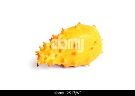 Bright orange kiwano fruit with spiky skin isolated on a white background. Stock Photo