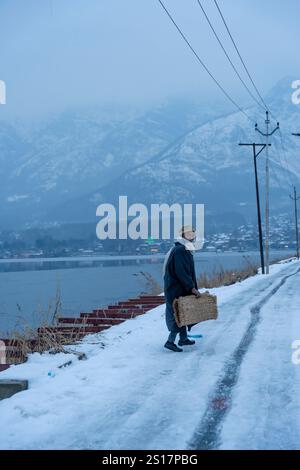 January 3, 2025, Srinagar, India: A man walks through the road during ...