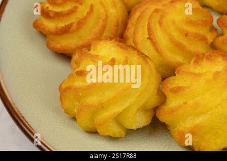 duchess potatoes on a plate Stock Photo