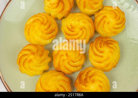 duchess potatoes on a plate Stock Photo