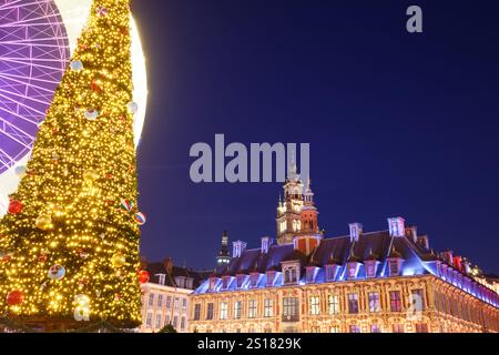 Lille, old facades in the center, the belfry of the Chamber of Commerce in background azt Christmas. France. Stock Photo