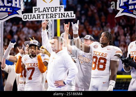 Atlanta, GA, USA. 1st Jan, 2025. Texas head coach Steve Sarkisian celebrates after defeating Arizona State in the CFP Quarterfinal at Mercedes-Benz Stadium in Atlanta, GA. (Scott Kinser/CSM). Credit: csm/Alamy Live News Stock Photo