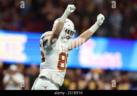Atlanta, United States. 01st Jan, 2025. Texas tight end Gunnar Helm (85) celebrates after scoring the game-winning touchdown in the second overtime period against Arizona State in the Peach Bowl at Mercedes-Benz Stadium in Atlanta, Georgia on Wednesday, January 1, 2025. Texas defeated Arizona State 39-31 in two overtimes and advance to the College Football Playoff semi-finals. Photo by Mike Zarrilli/UPI Credit: UPI/Ģ����ý Live News Stock Photo