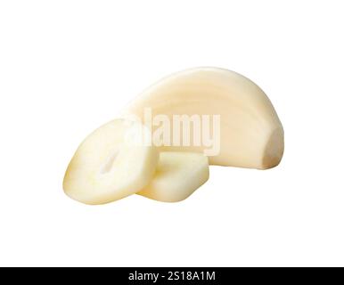 Side view of peeled garlic cloves with slices in stack is isolated on white background with clipping path. Stock Photo